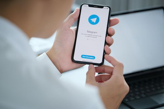 CHIANG MAI, THAILAND April 06 2021 : Telegram application icon on Apple iPhone screen close-up. Telegram app icon. Telegram is an online social media network. Social media app