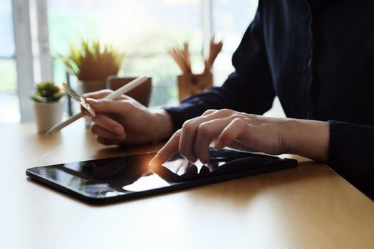 Online payment, Young Women's using tablet and hand holding cradit card for online shopping