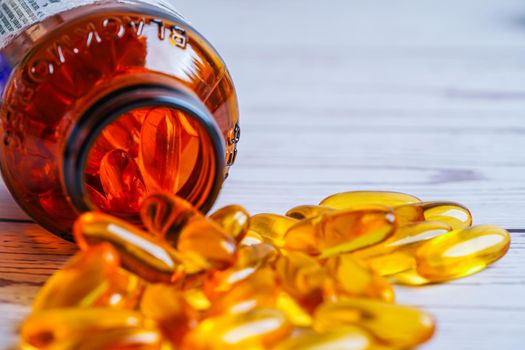 Bangkok, Thailand - April 27, 2022 Fish oil or Cod liver oil gel in capsules with omega 3 vitamins, supplementary healthy food