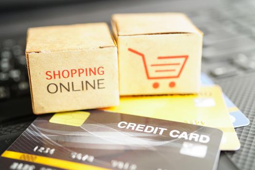 Online shopping, Shopping cart box on business graph, import export, finance commerce.