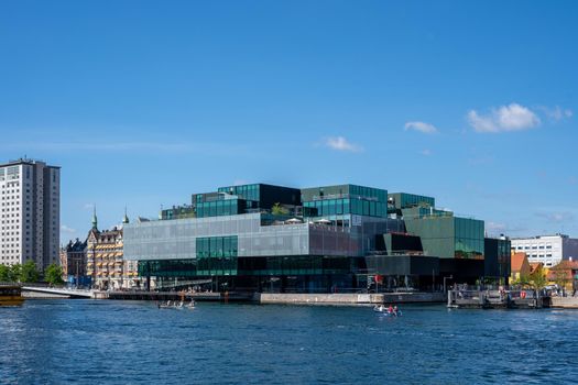 Copenhagen, Denmark - July 12, 2022: The Danish Architecture Center DAC, a modern glass building.