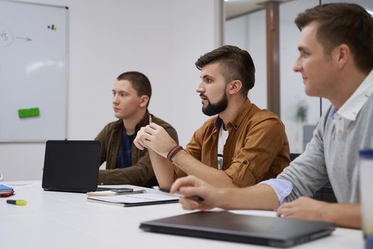 Business team and manager in a meeting at IT company office