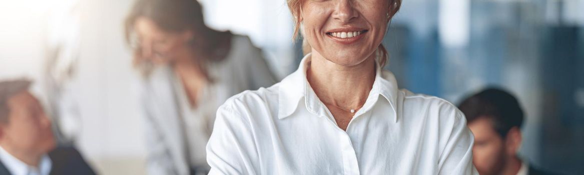 Close up of Portrait of beautiful mature confident business woman looking straight