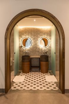 Modern tiled bathroom in beige and brown warm colors