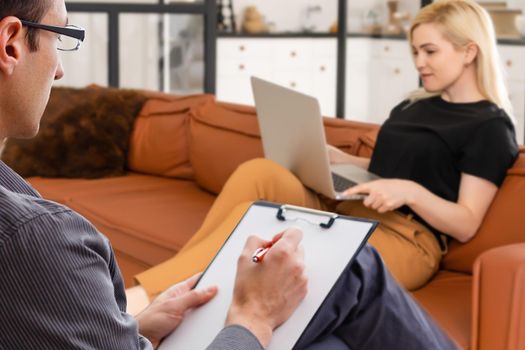 Photo of concentrated man psychotherapist. Business lady complaining need professional help