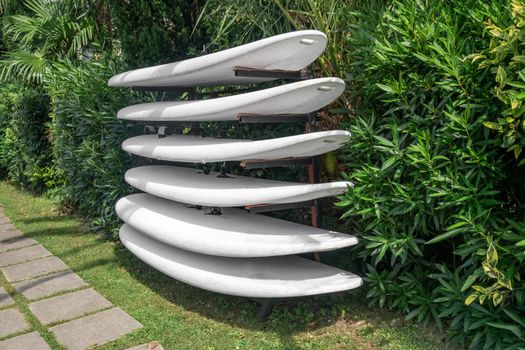 Surfboards on the beach at the surf school at lago di Garda