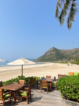 The table in a restaurant or a summer cafe on the sea coast