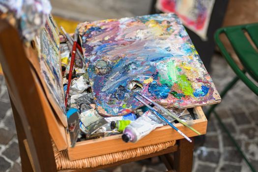 Paint strokes on the artist's palette