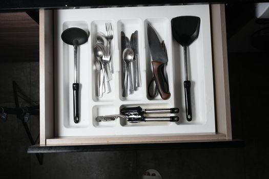 cutlery fork with knife and spoon in a drawer ,
