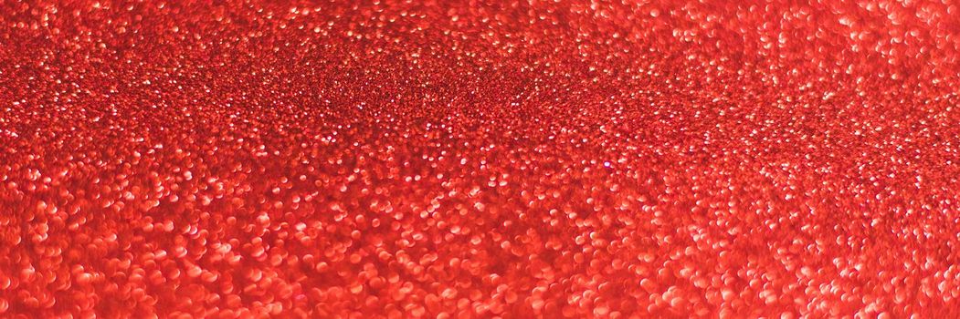 Red shiny background with sparkles. Abstract holiday background. Web banner.