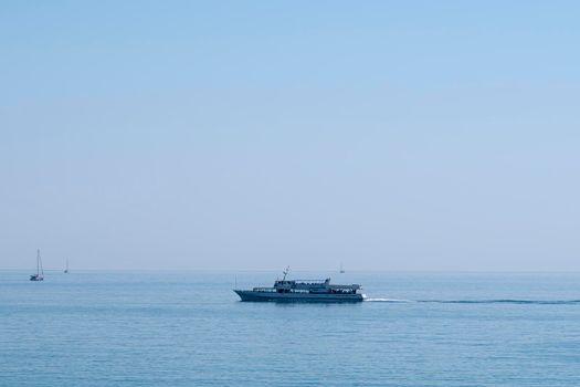 the ship is moving along the horizon of the sea. High quality 4k footage