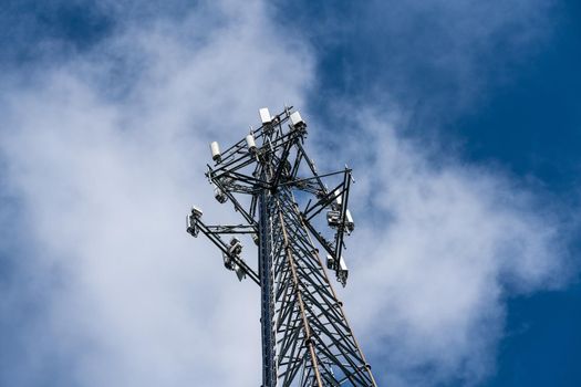 Aerial view of mobile phone cell tower to illustrate lack of broadband internet service in rural areas and need for investment