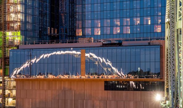 Reflection of the Korean veterans bridge illuminated in the evening in downtown Nashville Tennessee