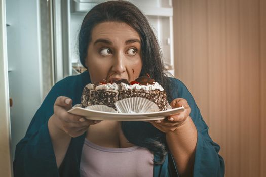 Plus Size Young Woman Opened Her Mouth About To Eat Chocolate Cake With Cherries, Hungry Caucasian Model Holding Plate With Dessert Going To Eat It While No One Sees