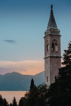 Beautiful view of the coast of Kotor Bay and St.Eustace's Church in the village Dobrota in Montenegro. Church of St. Eustachius is located in Dobrota , Kotor Montenegro