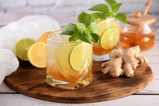   Refreshment organic non-alcohol cocktail. Honey ginger lemonade with a touch of basil flavor