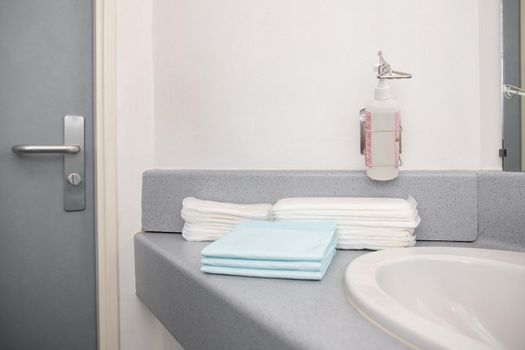 Chamber in the maternity hospital with the necessary things for mother and child. Pampers, sanitary napkins, antiseptic,pads