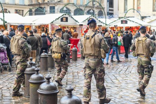 ROUEN, FRANCE - DECEMBER 08, 2019: A group of military patrols on the Christmas fair
