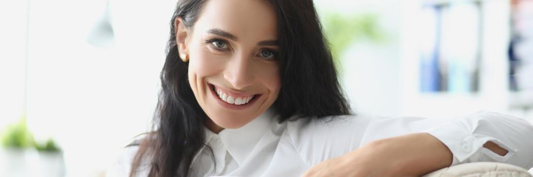 Portrait of beautiful brunette young woman chilling with cup of hot drink. Pause from work or dayoff at home. Coffee break, lunch, relax, happiness concept