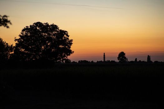 Orange sunset landscape country field scene