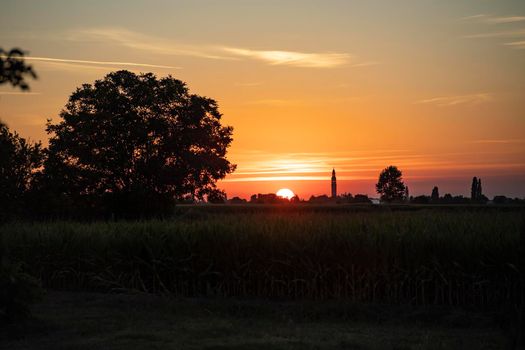 Orange sunset landscape country field scene