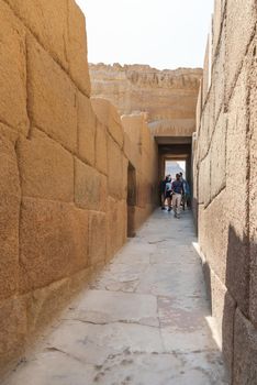 CAIRO, EGYPT - September 11, 2008. Tourists walk in corridor near the Great Pyramid of Giza and Sphinx. Architectural landmark in Africa.