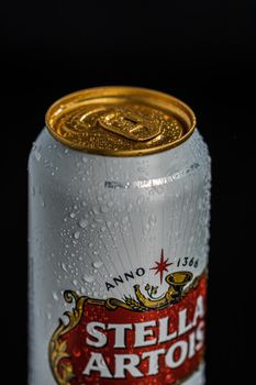 Condensation water droplets on Stella Artois beer can isolated on black. Bucharest, Romania, 2020