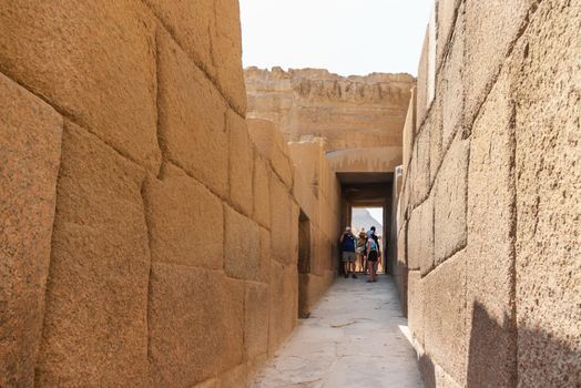 CAIRO, EGYPT - September 11, 2008. Tourists walk in corridor near the Great Pyramid of Giza and Sphinx. Architectural landmark in Africa.