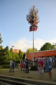 Brno - Bystrc, Czech Republic, June 25, 2022.  Traditional Czech feast. Folk Festival. Girls and boys dancing in beautiful costumes. An old Christian holiday, a day of abundance, joy and prosperity.