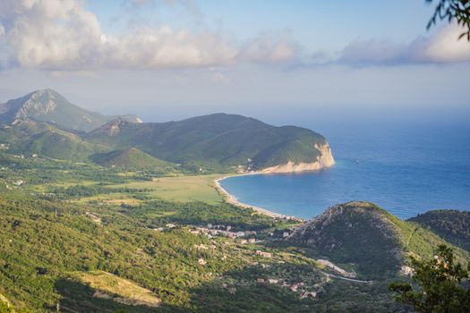 Aerial view of the small town Petrovac, Montenegro and Lucice beach.