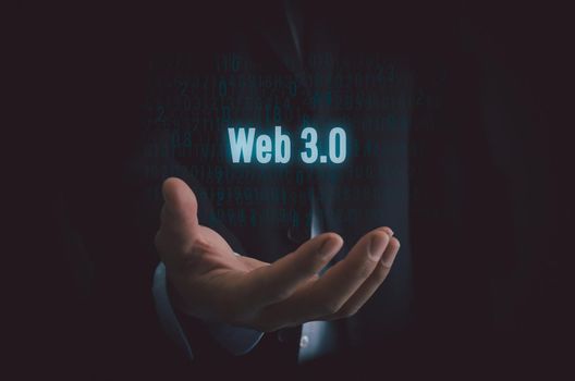 Businessman selecting web 3.0 on virtual screen.