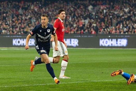 MELBOURNE, AUSTRALIA - JULY 15: Chris Ikonomidis of Melbourne Victory scores against Manchester United in a pre-season friendly football match at the MCG on 15th July 2022