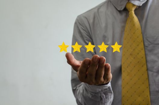 Customer concept excellent service for satisfaction five star rating with business man touch screen. About feedback and positive customer reviews.