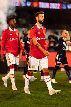 MELBOURNE, AUSTRALIA - JULY 15: Bruno Fernandes of Manchester United enters the field before Melbourne Victory plays Manchester United in a pre-season friendly football match at the MCG on 15th July 2022