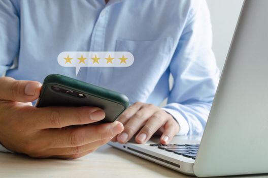 Customer service concept excellent service for satisfaction five star rating with business man holding smart phone.positive thinking and customer feedback.