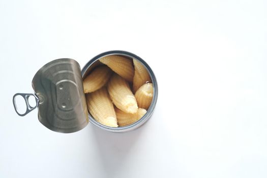 baby corn in a tin can container on white background ,