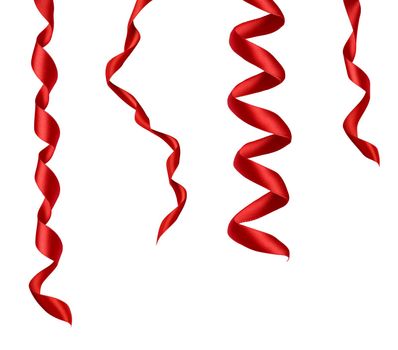 collection of various red ribbon pieces on white background. each one is shot separately