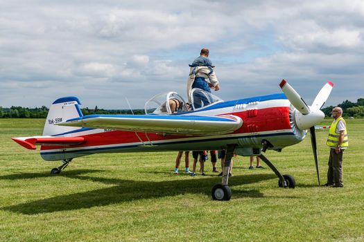 Breclav, Czech Republic - July 02, 2022 Aviation Day. Sports aerobatic aircraft Yak 55 ready at the airport