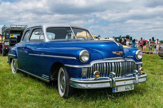 Breclav, Czech Republic - July 02, 2022 Aviation Day. De Soto Chrysler Custom coupe veteran car made in 1949