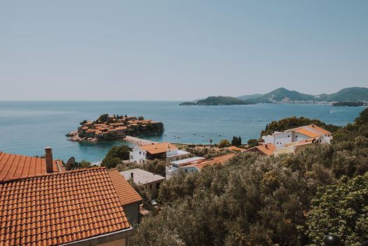 Sveti Stefan is a small isand on Adriatic coast of Montenegro near of Budva. Resort is known commercially as Aman Sveti Stefan. Sveti Stefan, Adriatic sea, Europe. Sveti Stefan peninsula on the Adriatic Sea in Budva, Montenegro