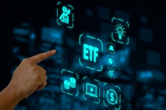 hand touching screen digital virtual futuristic interface icon ETF Exchange Traded Fund. Business stock market finance Index Concept.