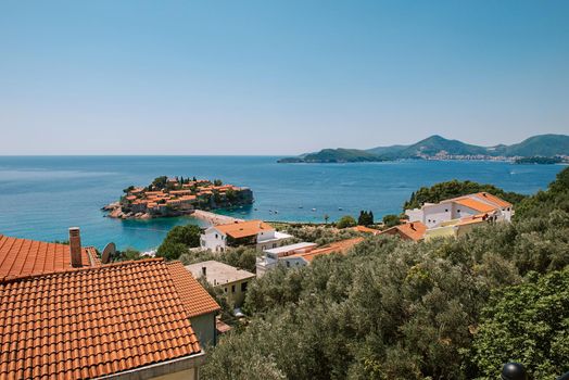 Sveti Stefan is a small isand on Adriatic coast of Montenegro near of Budva. Resort is known commercially as Aman Sveti Stefan. Sveti Stefan, Adriatic sea, Europe. Sveti Stefan peninsula on the Adriatic Sea in Budva, Montenegro