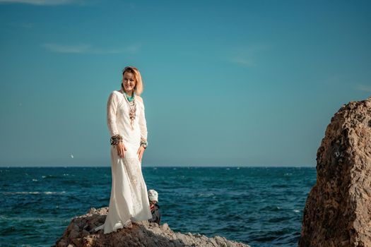 fashionable young model in boho style dress