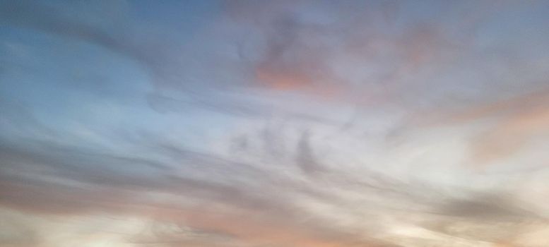 colorful late afternoon sunset in the countryside of Brazil inserting the day