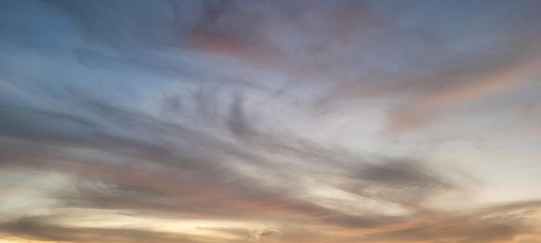 colorful late afternoon sunset in the countryside of Brazil inserting the day