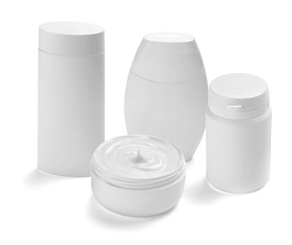 close up of a white beauty cream container and tube on white background