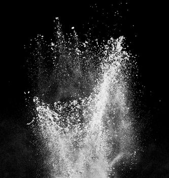 close up of steam smoke powder on black background
