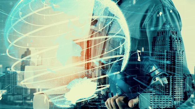Future building construction and inventive engineering project concept with HUD hologram graphic design. Building engineer, architect people or construction worker works with modern civil technology.