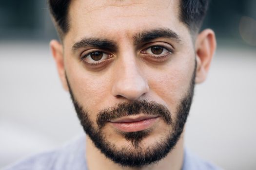 Portrait of nice-looking caucasian multi-race beautiful businessperson elegant young man looking into camera. Career people. Fashion, beauty. Male portraits