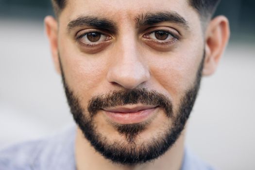 Caucasian young bearded man in formal outfit looking to camera outside on street feel happy businessman portrait business modern manager pretty.